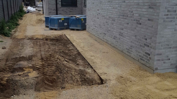 Belægning klargøring ved gråt hus